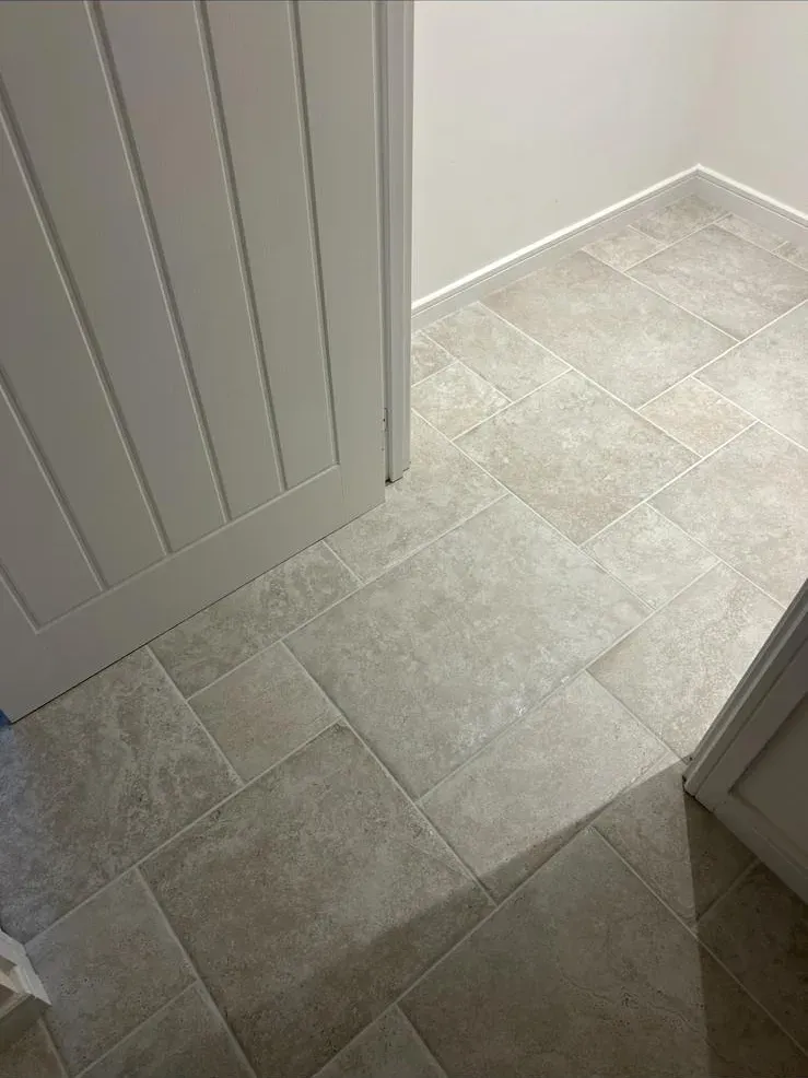 Stone-effect hallway by Prestige Tiling